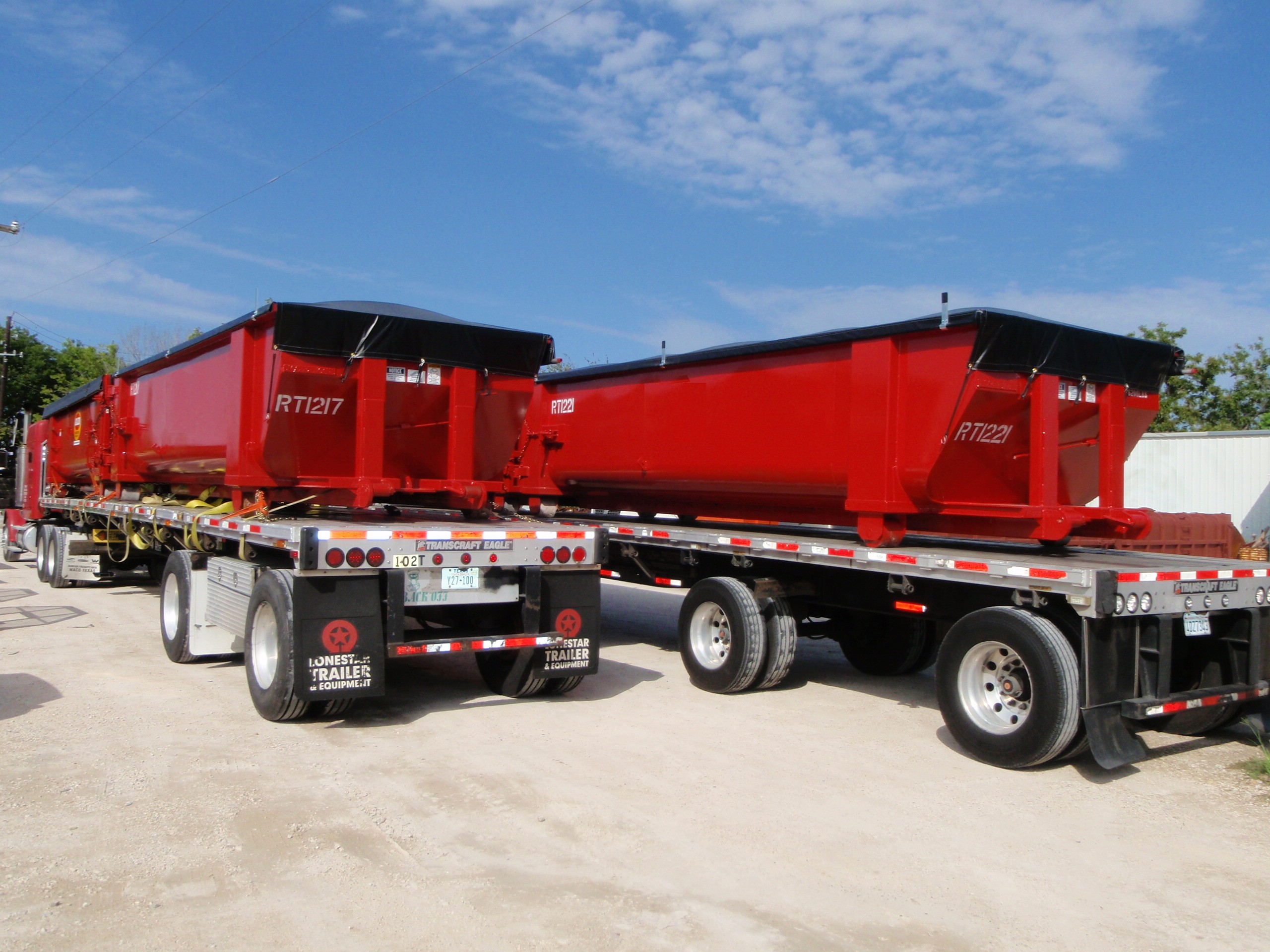 25yd Roll-Taro Containers loaded on Flat-Bed
